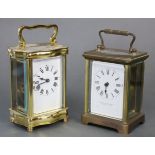 A French gilt-brass carriage timepiece with serpentine sides, white enamel dial with black roman