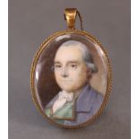 ENGLISH SCHOOL, 19th century. A portrait miniature of a gentleman wearing blue coat with green