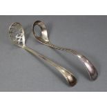 A Dutch silver .934 standard egg ladle with beaded edge to the long curved handle, 1889; & a similar