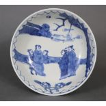A Chinese blue & white porcelain bowl decorated in the Ming style with figures in a landscape,