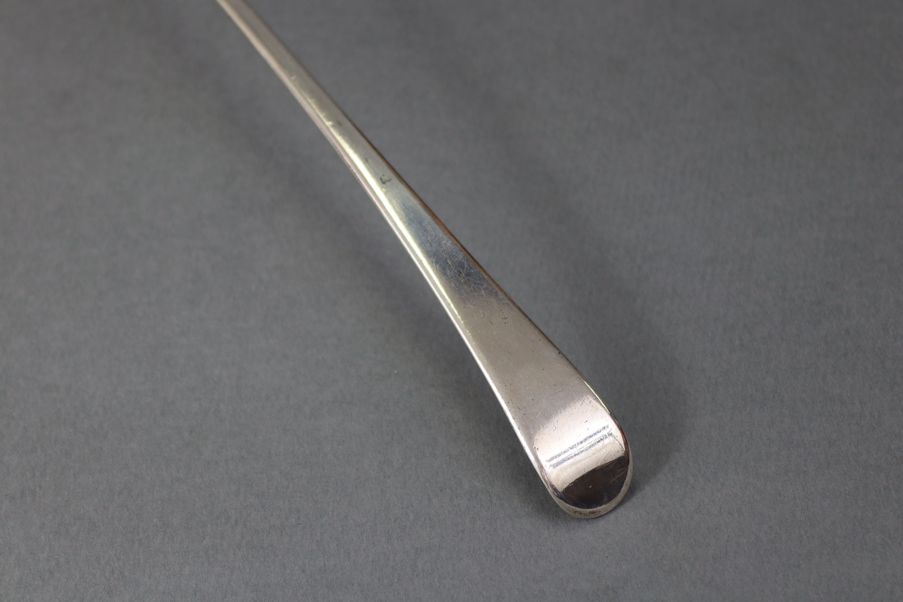 A George III silver Old English pattern soup ladle with plain round bowl, 13¼” long; London 1769, by - Image 7 of 8