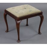 A late Victorian mahogany rectangular stool with padded drop-in seat upholstered floral