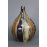 A flambé glazed ovoid pottery vase with thin tapering neck, 10½” high.