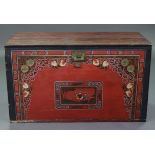 A Chinese painted wooden trunk, decorated to the front with a romantic figure scene in a reserve
