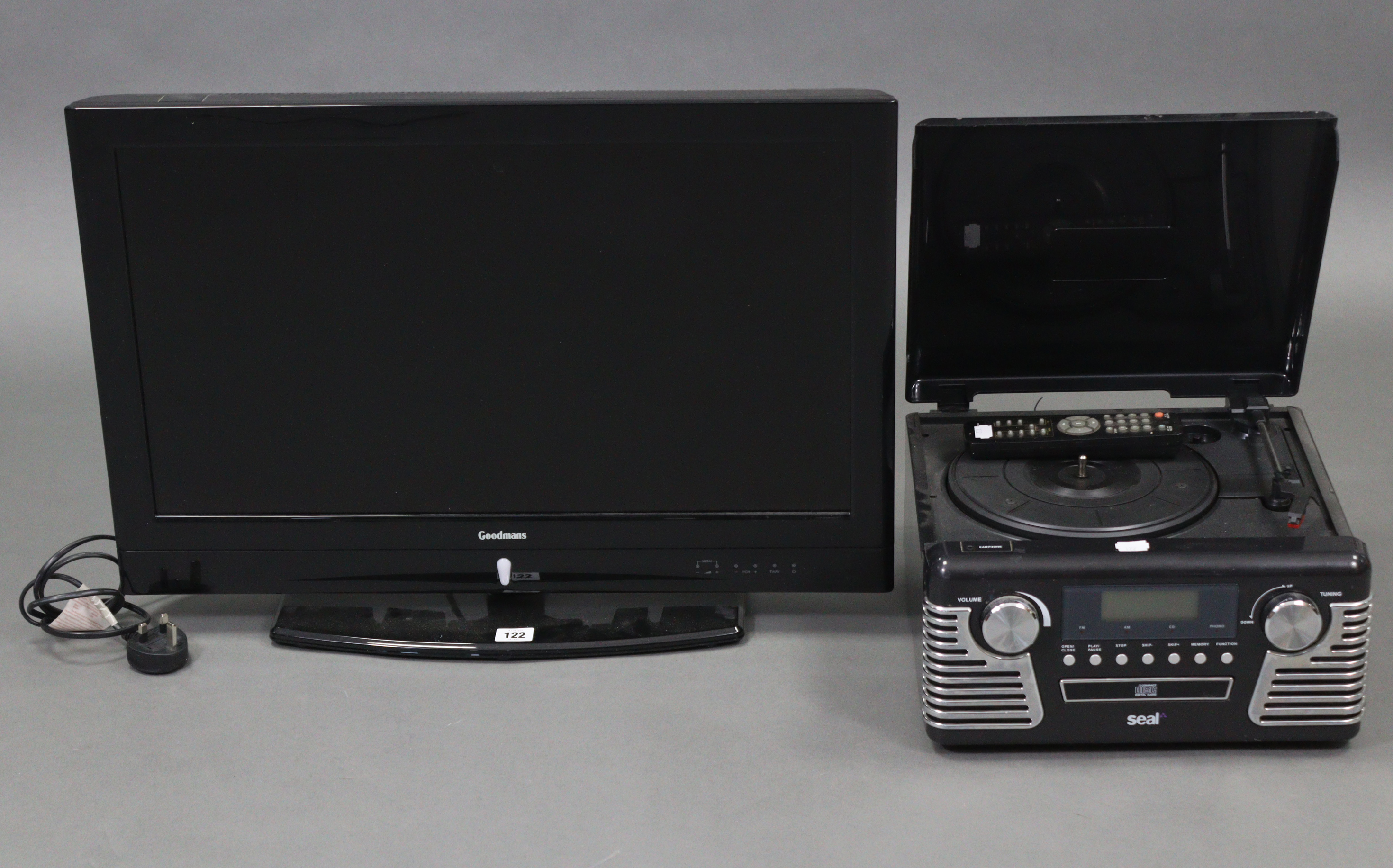 A Goodman’s 26” colour television; & a Seal compact disc player with remote control, both w.o.