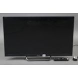 A Sony “Bravia” 31” colour television with remote control, w.o.