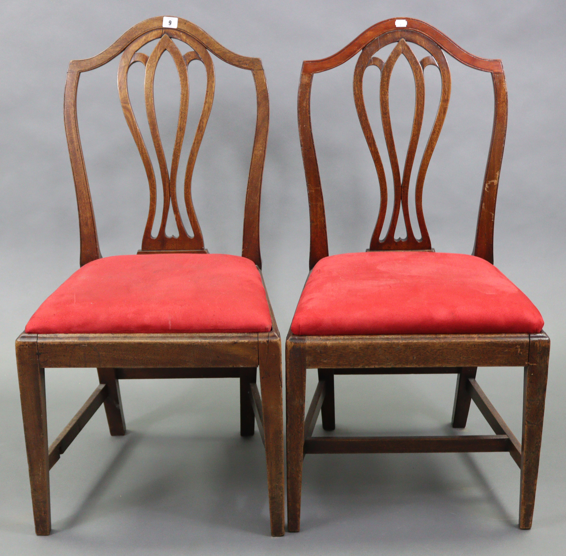 A pair of Georgian mahogany dining chairs each with shaped & pierced splat to the back, with