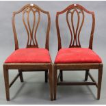 A pair of Georgian mahogany dining chairs each with shaped & pierced splat to the back, with