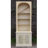 A white & grey painted marble-effect wooden tall bookcase, the upper part with moulded cornice &