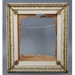 A cream & gilt painted wooden picture frame, 24” x 20” (internal size).