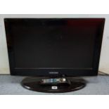 A Samsung 21” HD ready colour television with remote control, & a Vax “Rapide Spring Clean”