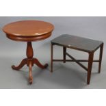 A mahogany tripod table with circular top, & on vase-turned centre column & three cabriole legs,