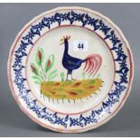 *LOT WITHDRAWN* A late 19th century Llanelly pottery dish, with painted cockerel decoration in a blu