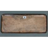 A Newlyn copper rectangular tray with engraved decoration of St. Michael’s Mount (stamped Newlyn),