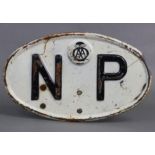 A mid-20th century white enamelled steel oval sign “AA N.P.”, 7½” x 12½”.