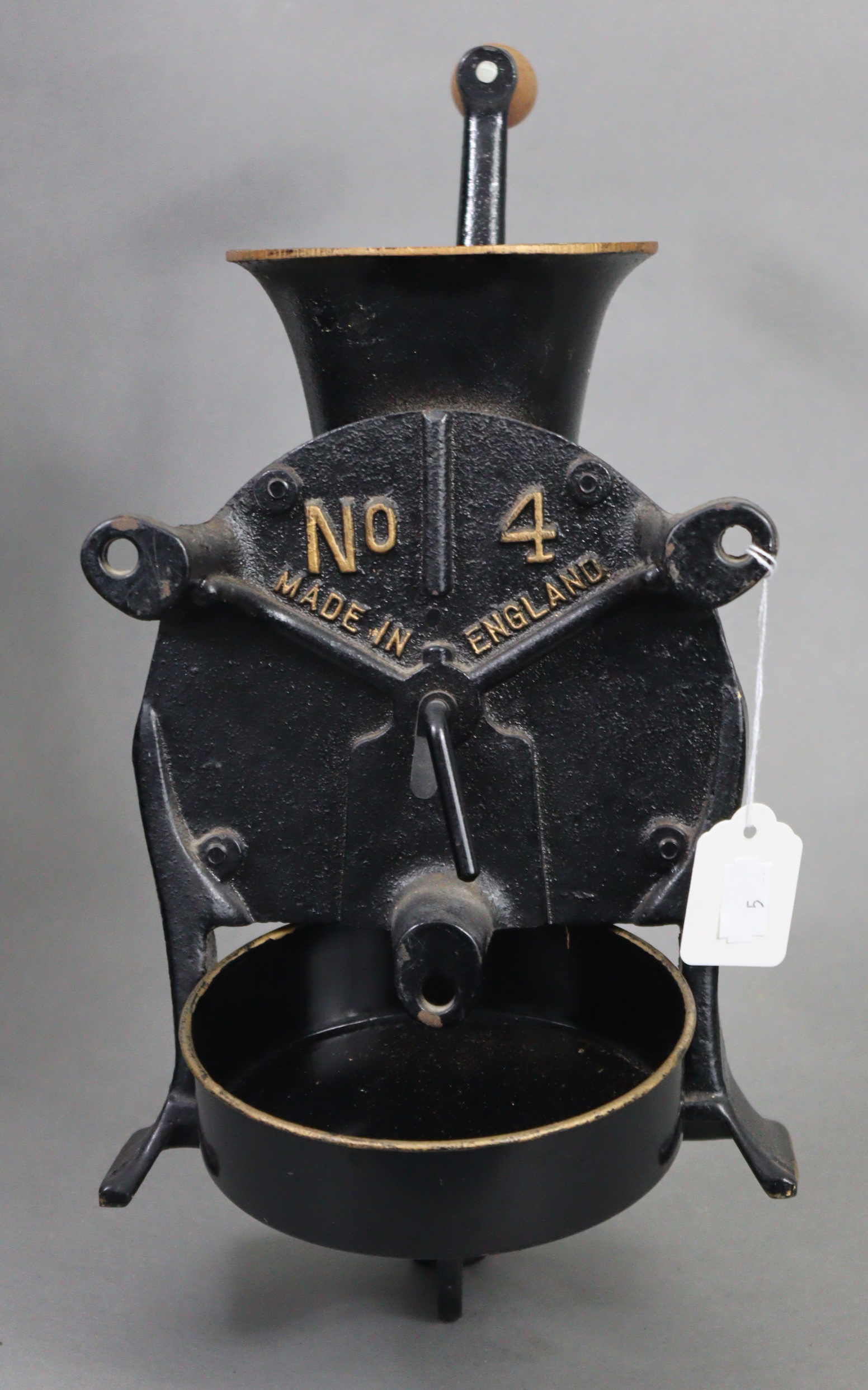 A vintage Spong & Co. Ltd. black & gold painted cast-iron coffee grinder (No. 4), complete with