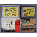 Two John Bull printing outfits, both boxed; two sets of drawing implements, both cased; & a treen