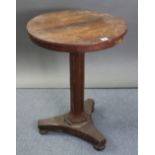 A 19th century rosewood occasional table with circular top & on octagonal centre column & triform