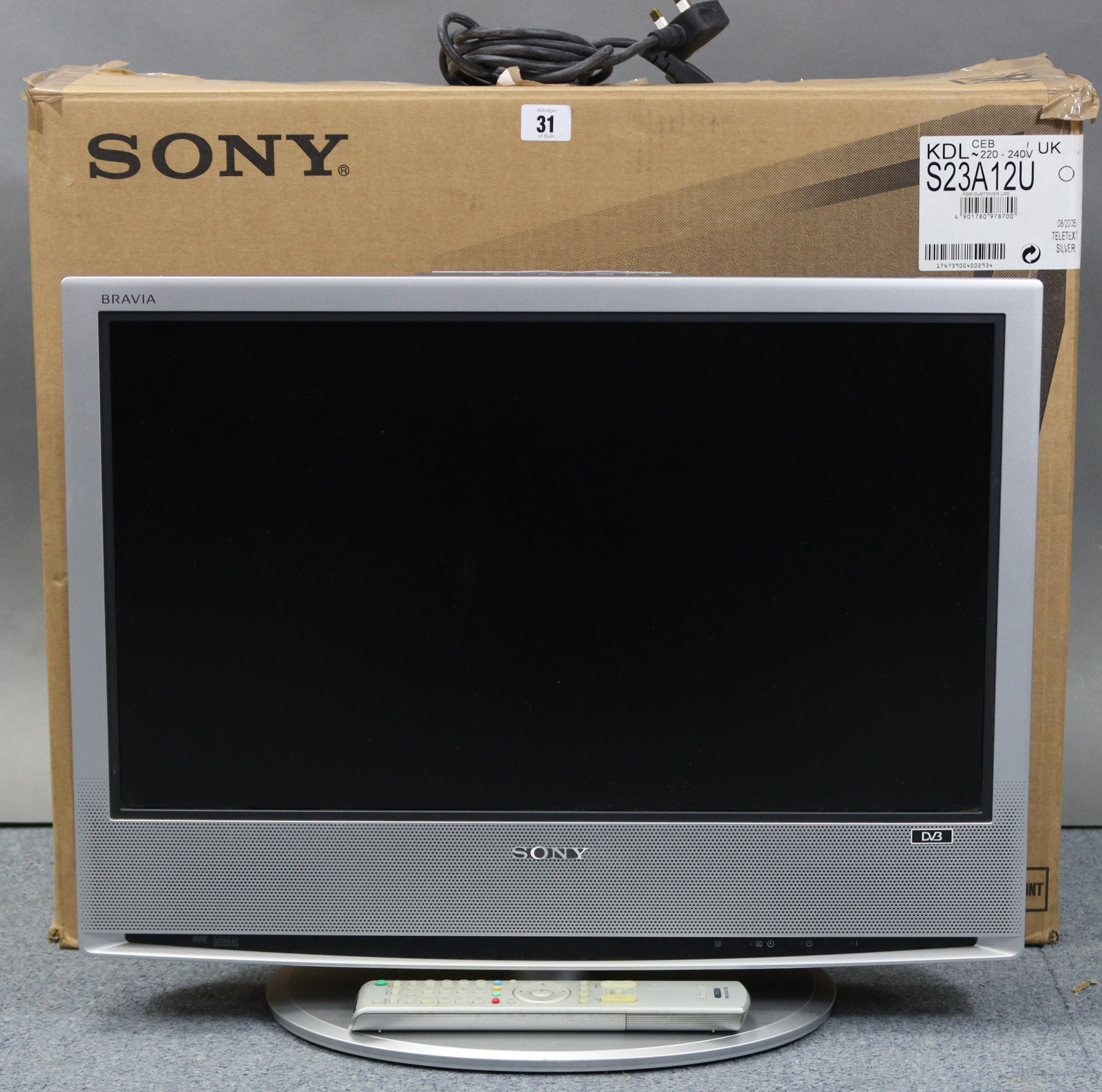 A Sony “Bravia” 23” LCD television with remote control, boxed, w.o.