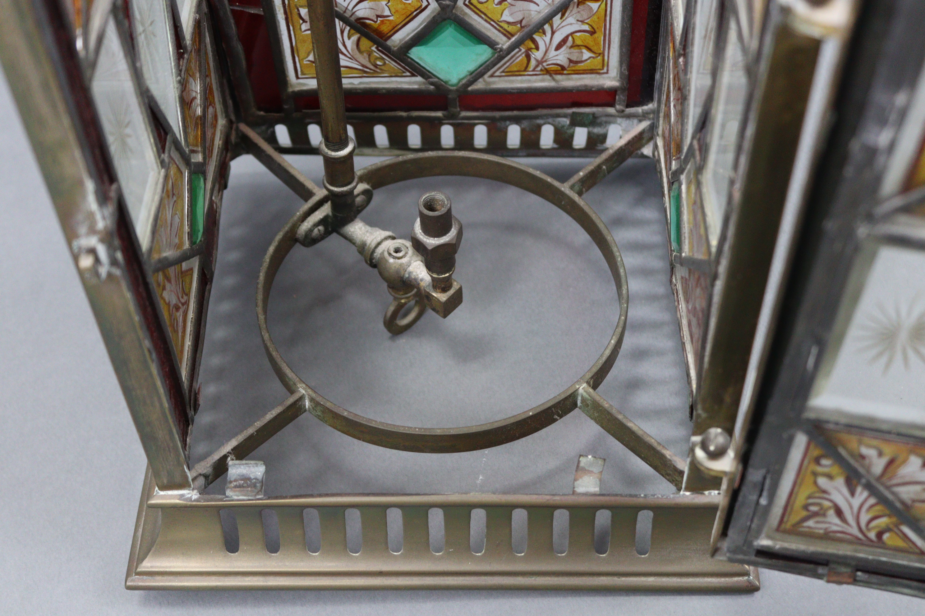 An Edwardian brass hall lantern of square form & inset four stained, bevelled, & leaded glazed - Image 3 of 3