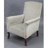 An Edwardian armchair upholstered grey velour, & on short square legs with steel castors.