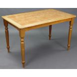 A beech rectangular tile-top kitchen table on four turned legs, 47” wide x 29½” high x 29½” deep.