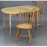 A light-oak finish rectangular kitchen table on four turned legs, 48” x 29½”, & a pair of spindle-