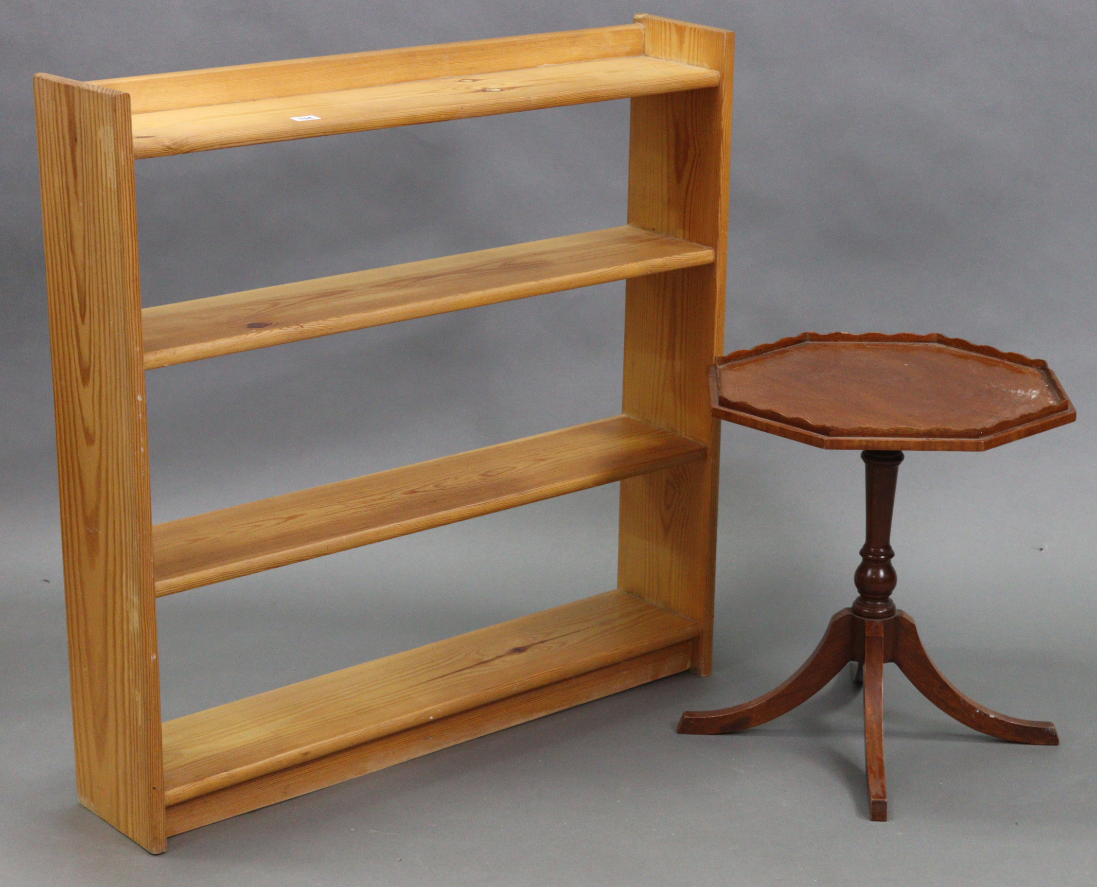 A pine four-tier standing open bookcase, 36” wide x 36” high; & a mahogany wine table.