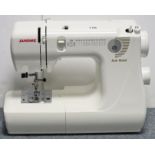 A Janome “Jem Gold” electric sewing machine, with case.