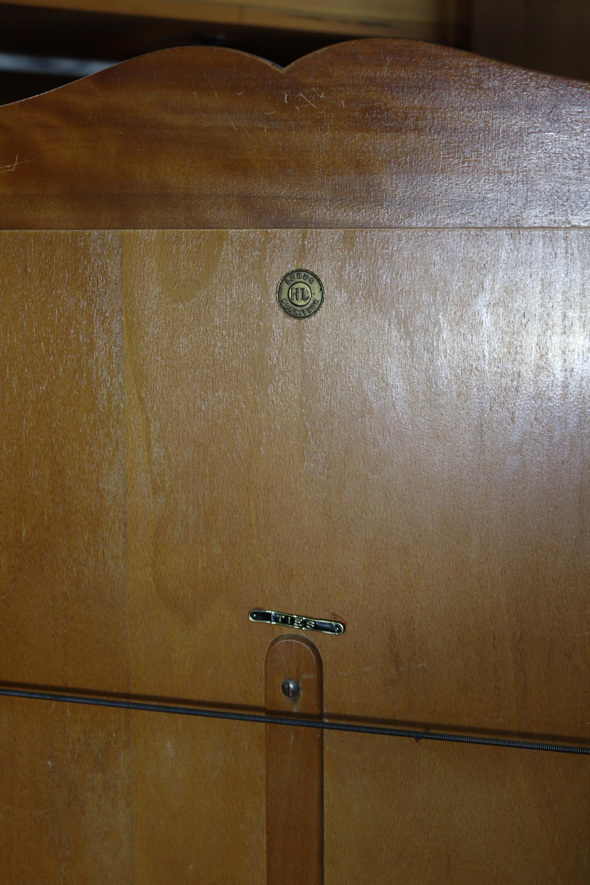 A 1960’s Lebus walnut-finish four-piece bedroom suite comprising a single-door wardrobe, 48” wide - Image 9 of 11