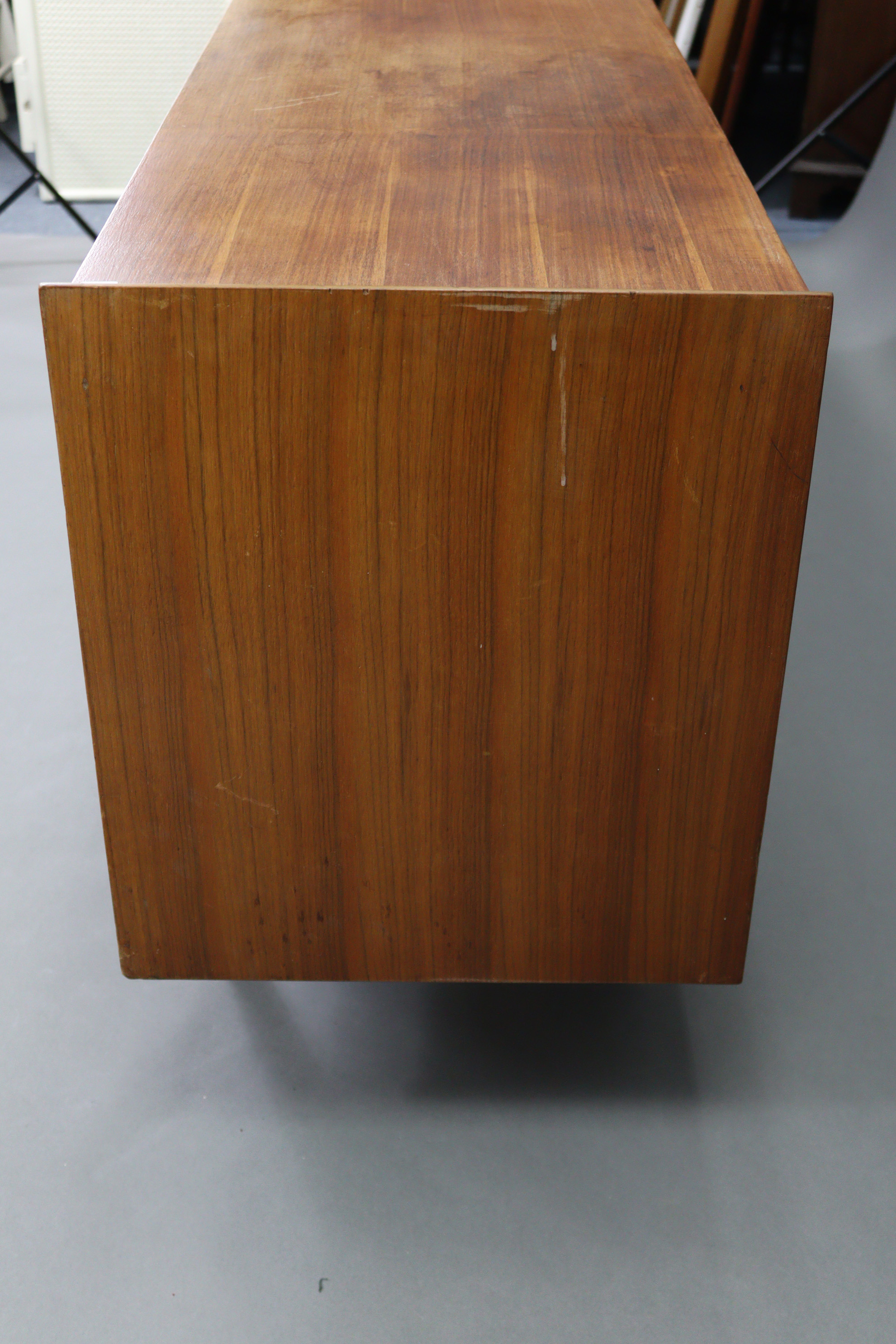 A Younger’s teak sideboard, fitted four long graduated drawers to centre flanked by cupboard to - Image 6 of 9
