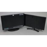 A Panasonic “Viera” 26” HDMI television; together with two other televisions, each with remote