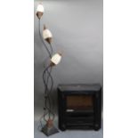 A coal effect electric fire in black-metal-finish case, 24” wide, w.o.; & a wrought-metal standard