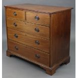 A 19th century mahogany chest, fitted two short & three long drawers with brass swing handles, &