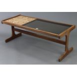 A G-Plan teak low coffee table, inset tiles & plate-glass to the rectangular top, & on square end