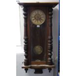 A late 19th/early 20th century Vienna-type wall clock with two part dial, striking movement, & in