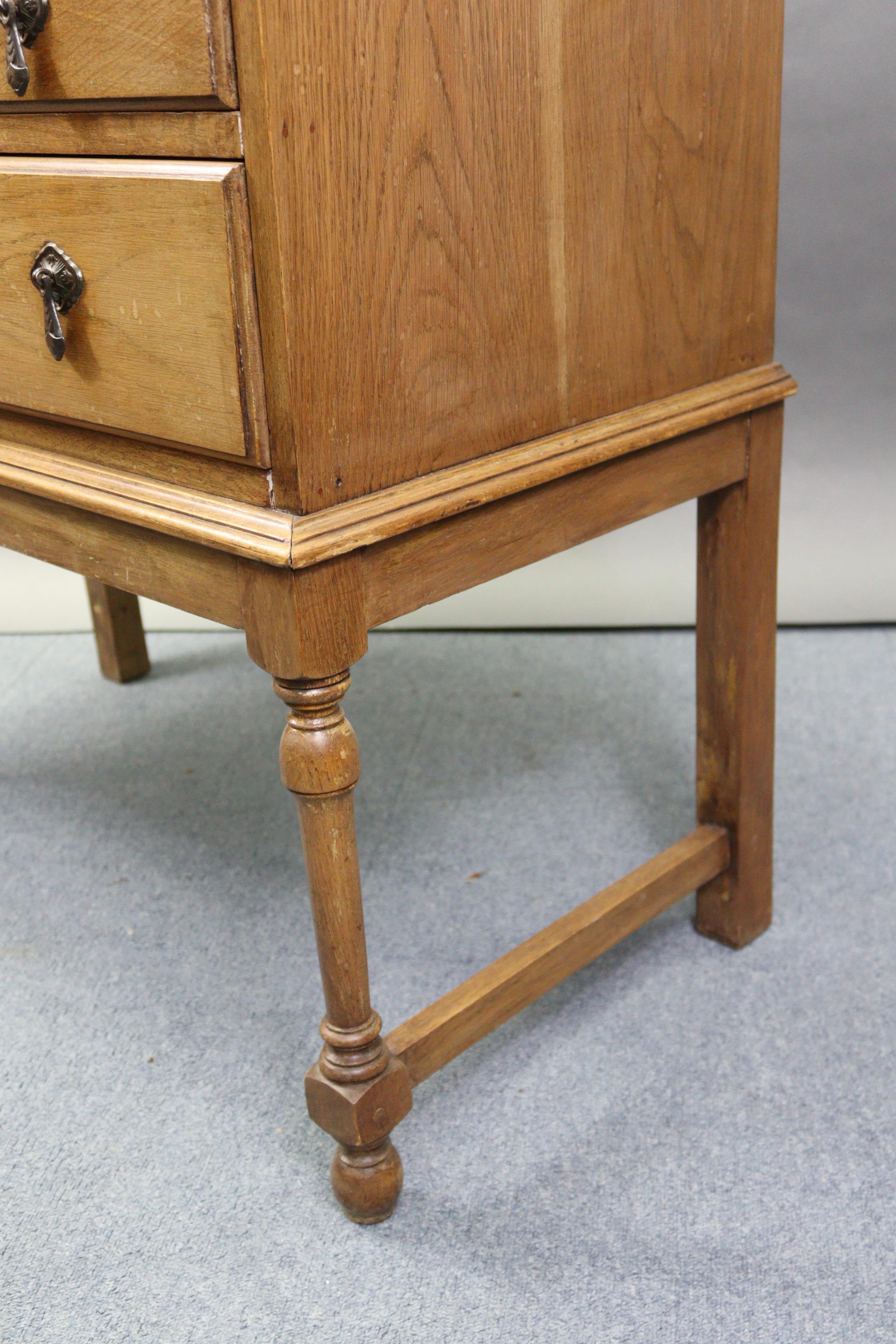 An early/mid-20th century oak bureau with fitted interior enclosed by fall-front above two long - Image 5 of 7