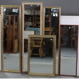 An Edwardian oak frame oval wall mirror, inset bevelled plate, 22½” x 34½”; together with five