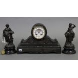 A late 19th century garniture comprising a domed-top mantel clock with two part white enamel dial,