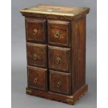 An eastern-style brass-mounted hardwood small upright chest fitted two ranks of three long drawers