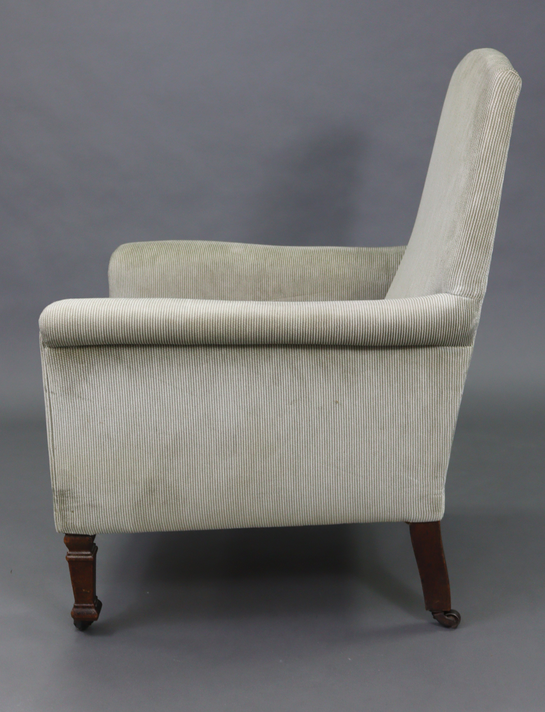 An Edwardian armchair upholstered grey velour, & on short square legs with steel castors. - Image 2 of 6