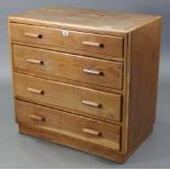 A small oak chest fitted four long graduated drawers with block handles, & on plinth base, 32”