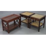 A mahogany finish rectangular tray-top coffee table, 27½” wide x 20½” high; & a similar pair of