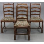 A set of four ladder-back dining chairs with padded drop-in seats & on turned legs with plain