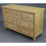 A light oak side cabinet, fitted three small drawers above to ranks of two long drawers, 46¾” wide x