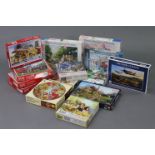 Fourteen various jig-saw puzzles, all boxed.