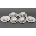 A Japanese eggshell twelve piece part tea service with bright-coloured dragon decoration, the cups