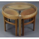 A Nathan nest of four occasional tables (three navette shaped tables under one), the larger circular
