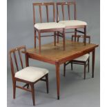 A Danish (?) teak draw-leaf dining table on four square tapered legs, 35” x 93” (open), & a ditto