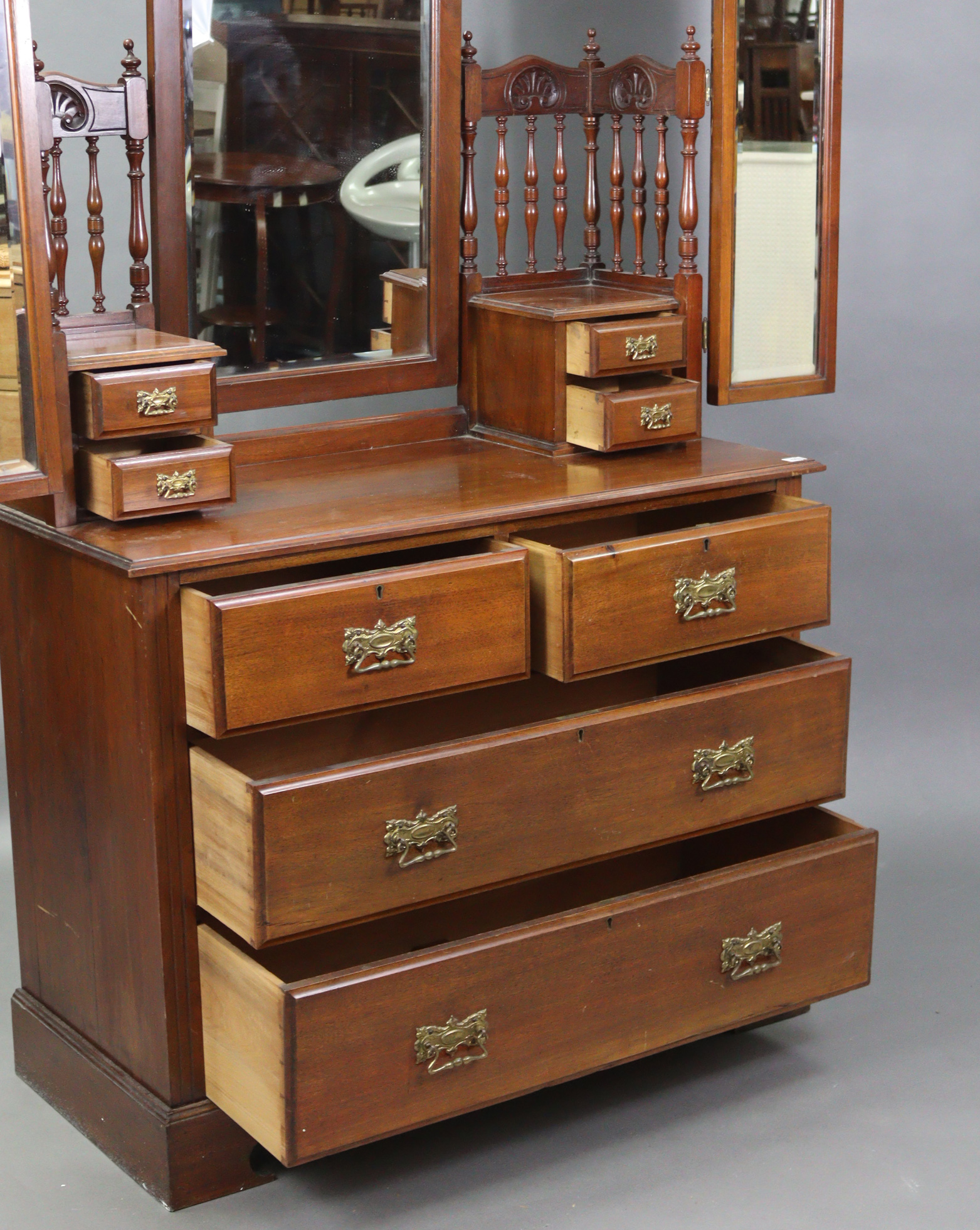 A Victorian walnut dressing chest with three mirrors to the stage back, fitted two short & two - Image 2 of 2